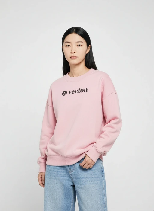 Virtual model in pink Veeton sweatshirt and dark jeans on red studio background